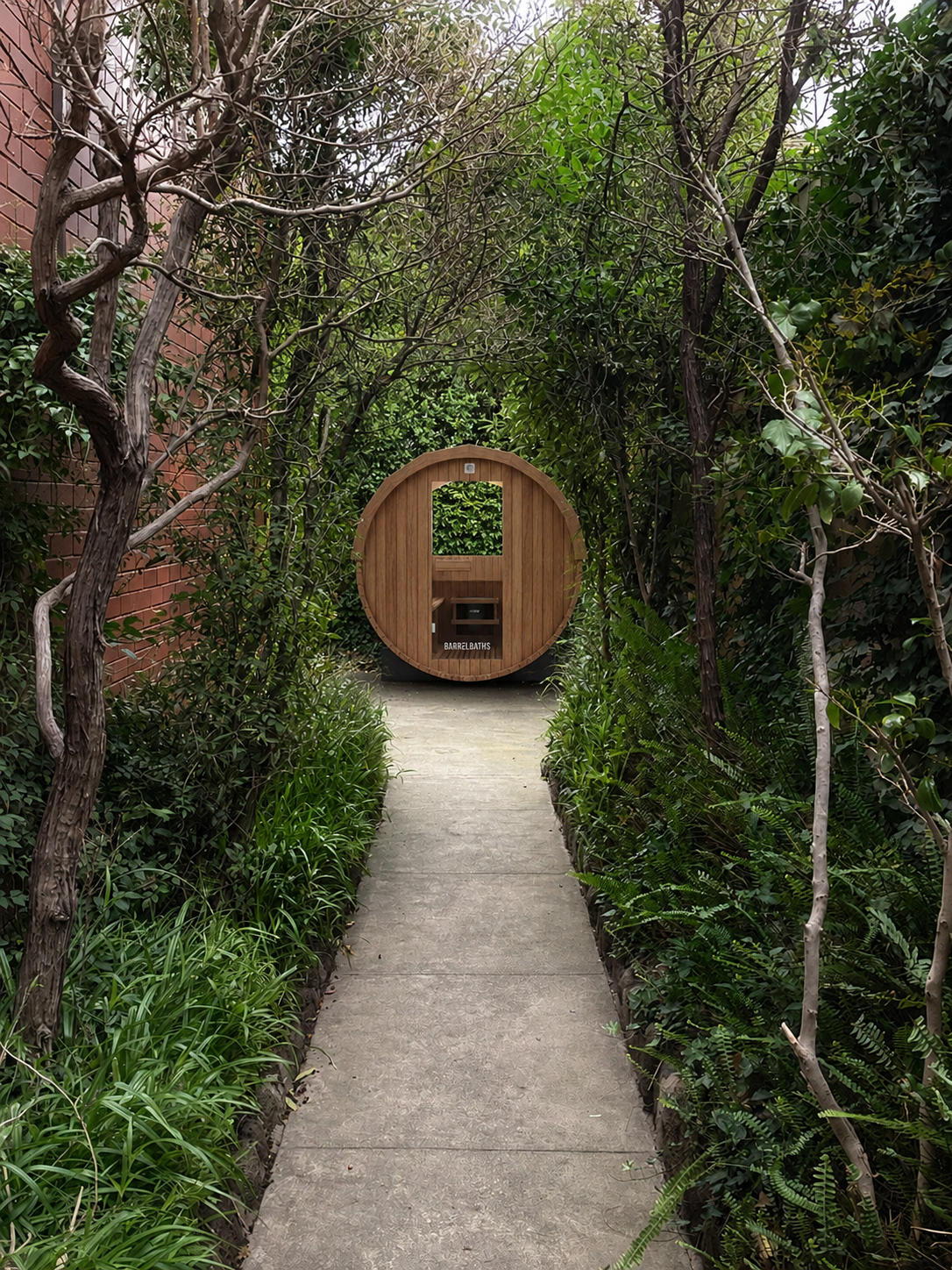 barrel sauna at the end of a path