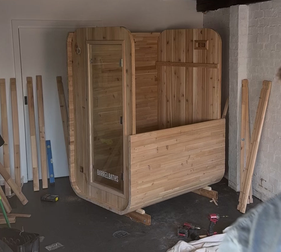 Load video: cube sauna fast motion vision of it being built